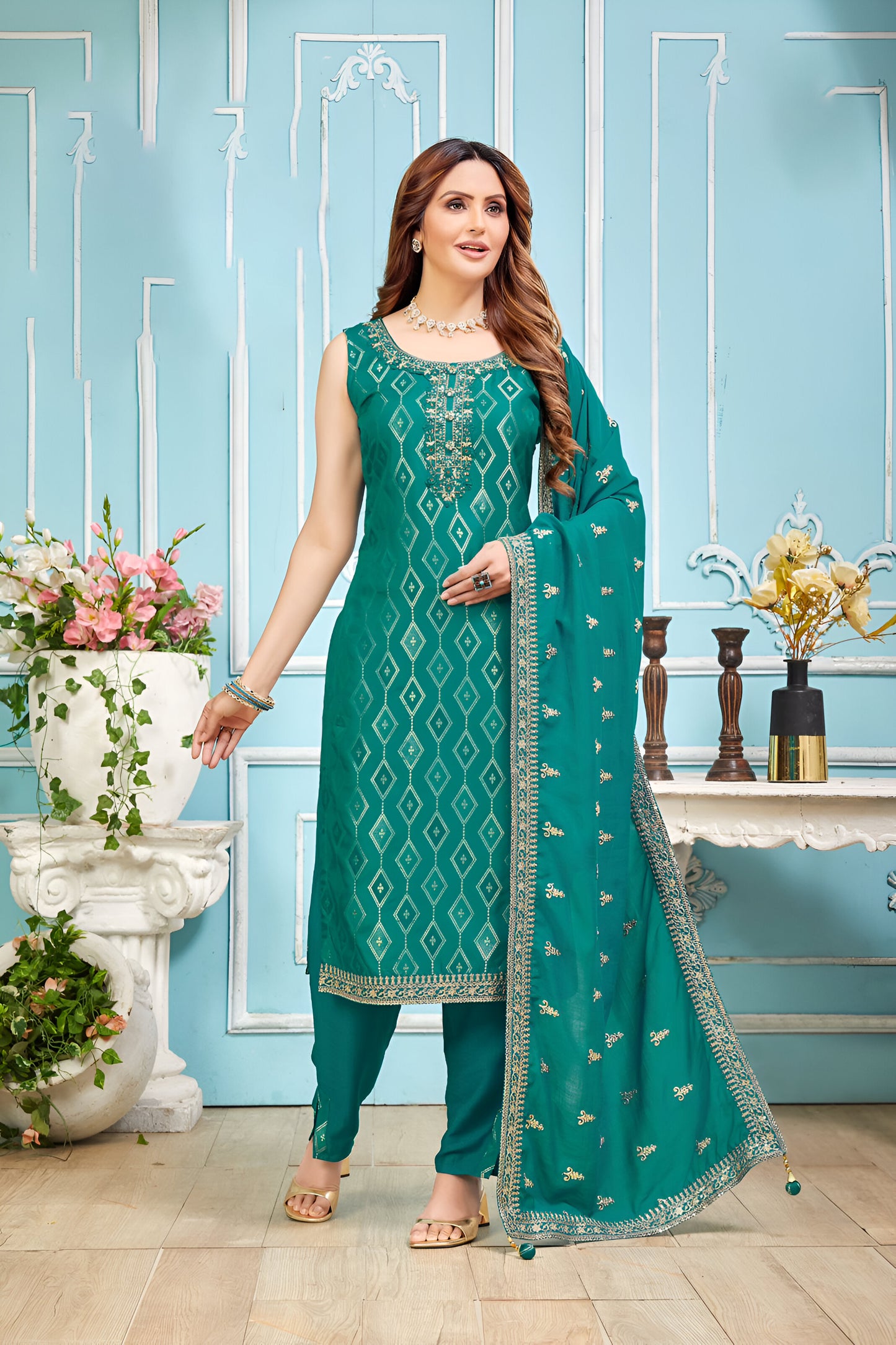 Teal Green Embroidered Salwar Suit.
