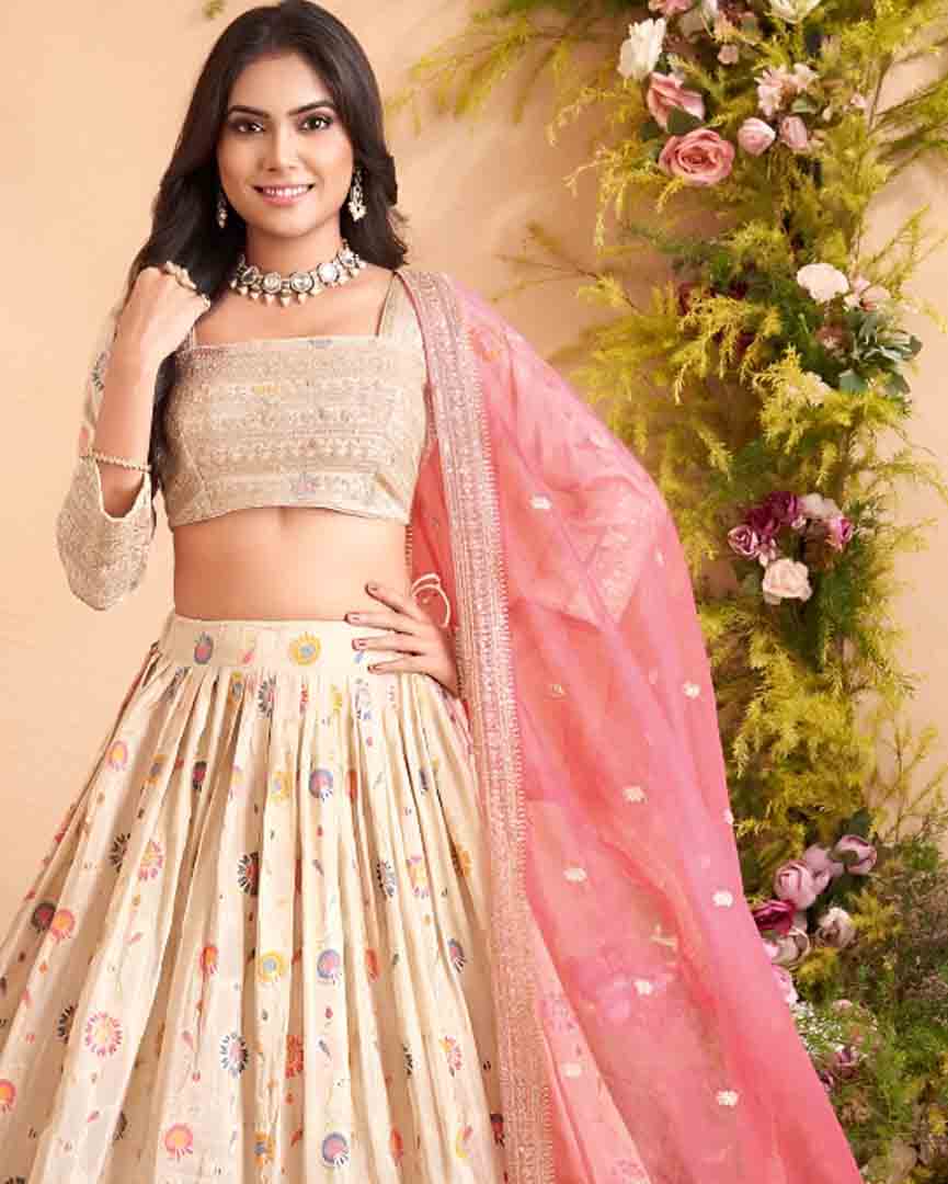 Ivory Multi-Color Embroidered Lehenga Choli with Pink Net Dupatta