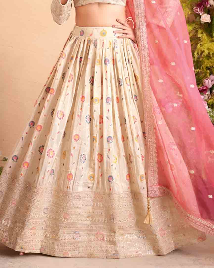 Ivory Multi-Color Embroidered Lehenga Choli with Pink Net Dupatta