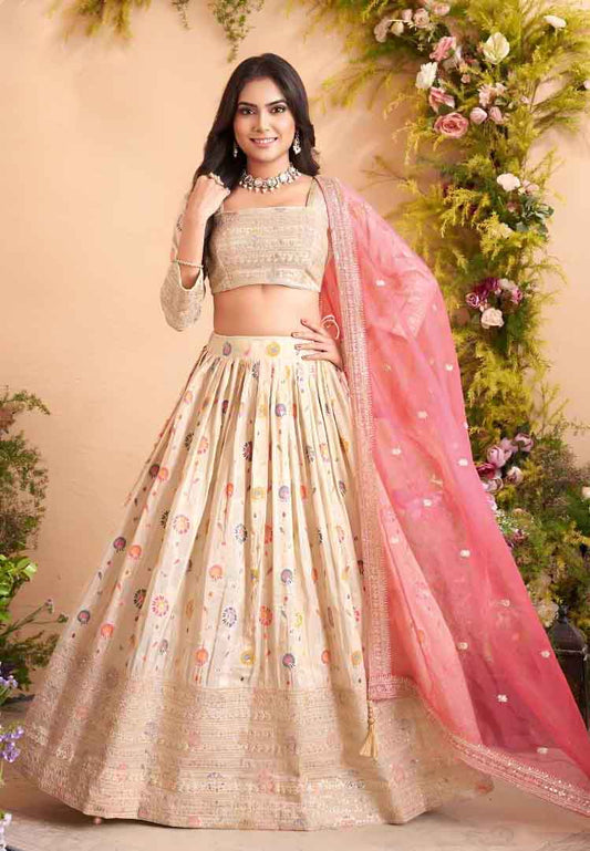 Ivory Multi-Color Embroidered Lehenga Choli with Pink Net Dupatta
